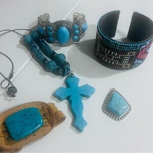 3 bracelets 1 pendant & 1 cross necklace.  Turquoise and silver colored